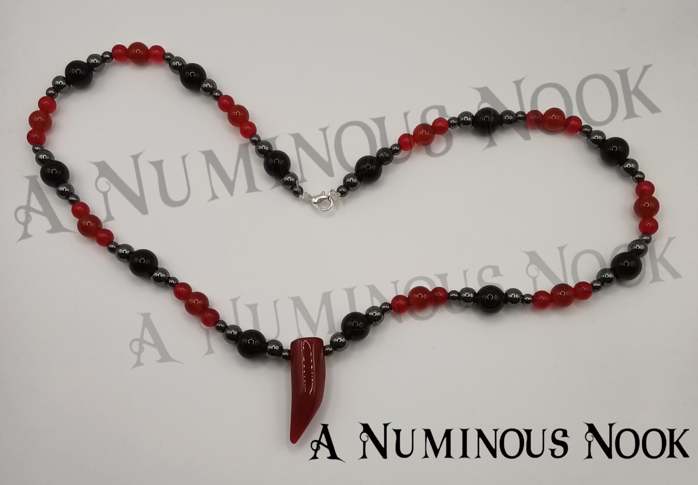 Carnelian, onyx, and hematite necklace