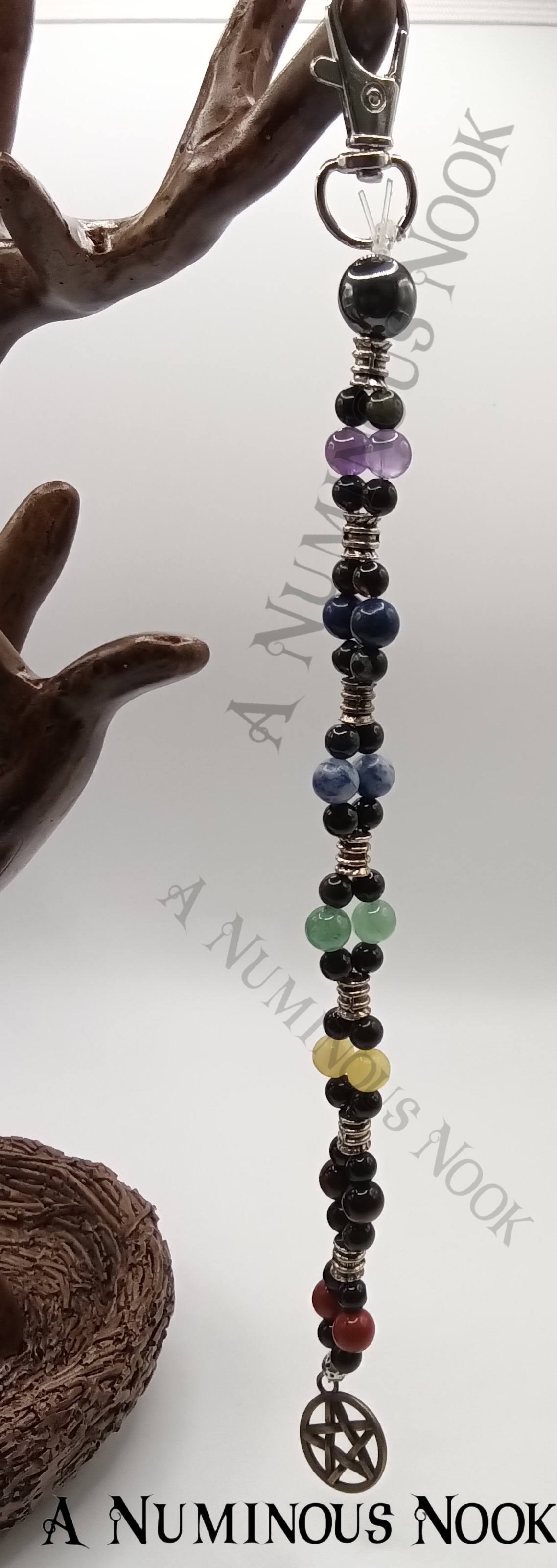 Silver star with circle around charm chakra clip