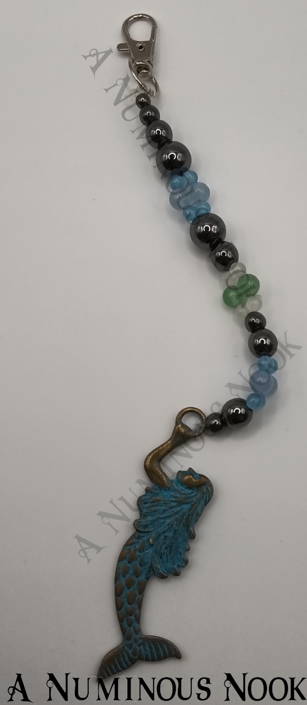 Hematite, jade and quartz mermaid clip