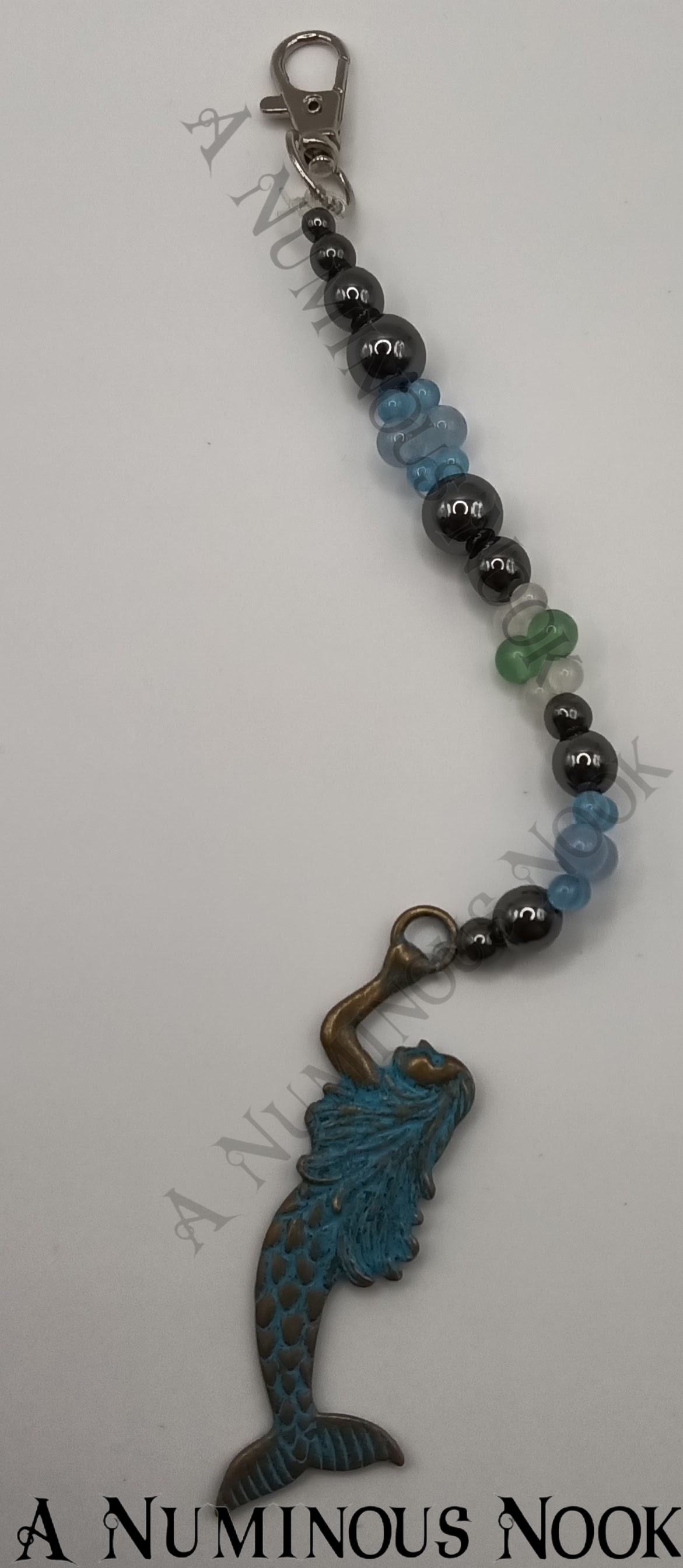 Hematite, jade and quartz mermaid clip