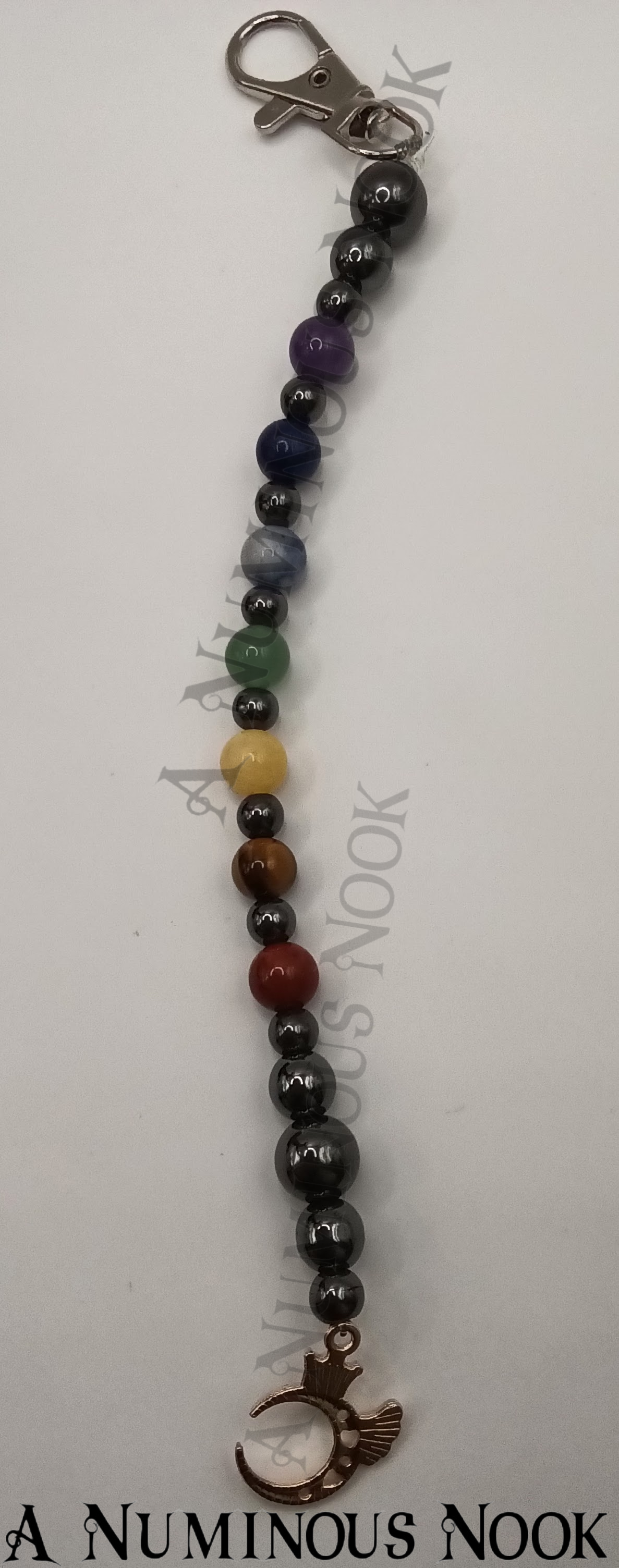 Half moon with hearts and a wing chakra clip