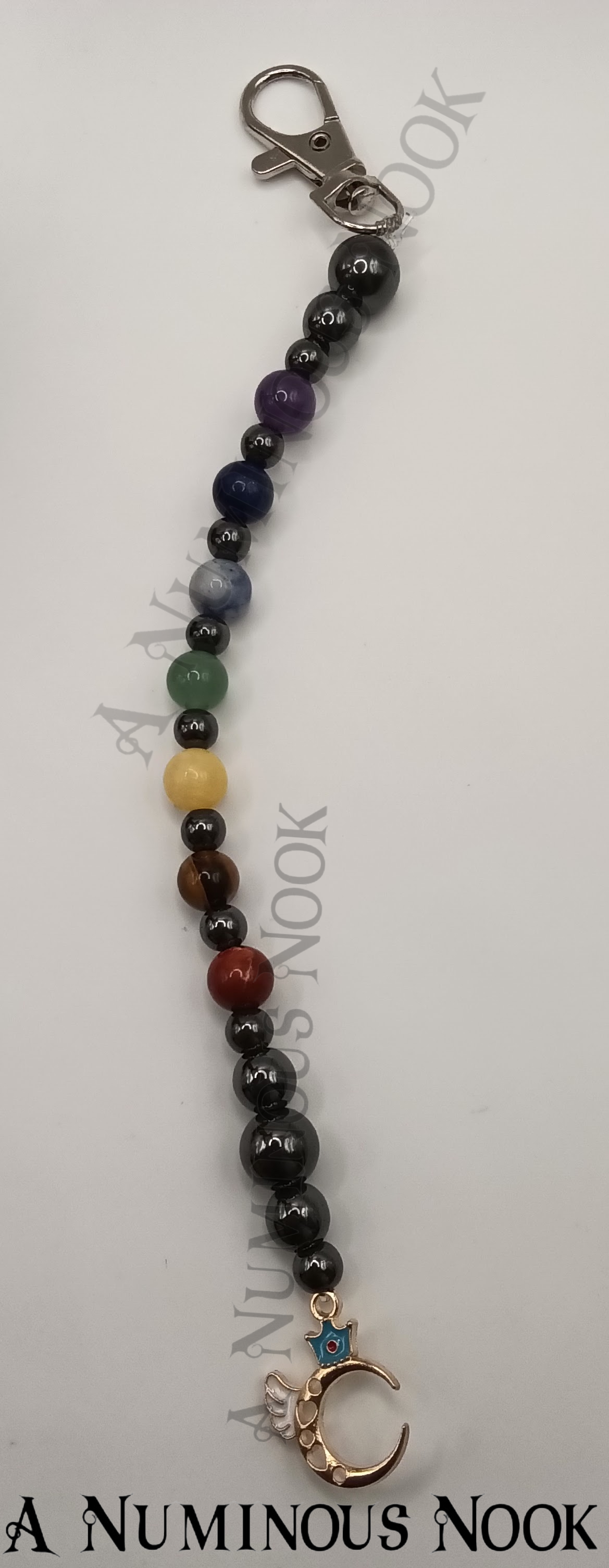 Half moon with hearts and a wing chakra clip