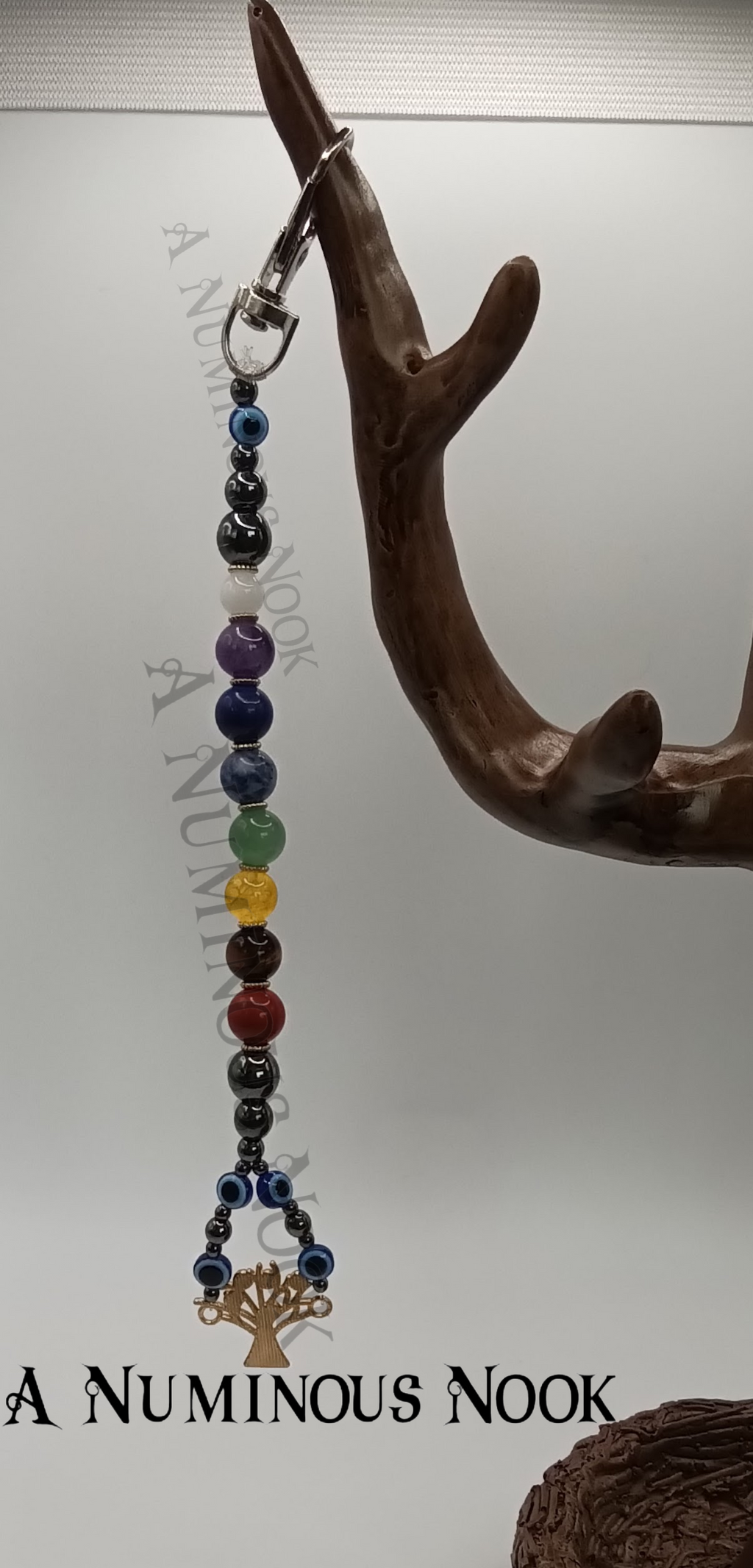 Evil eye tree chakra clip