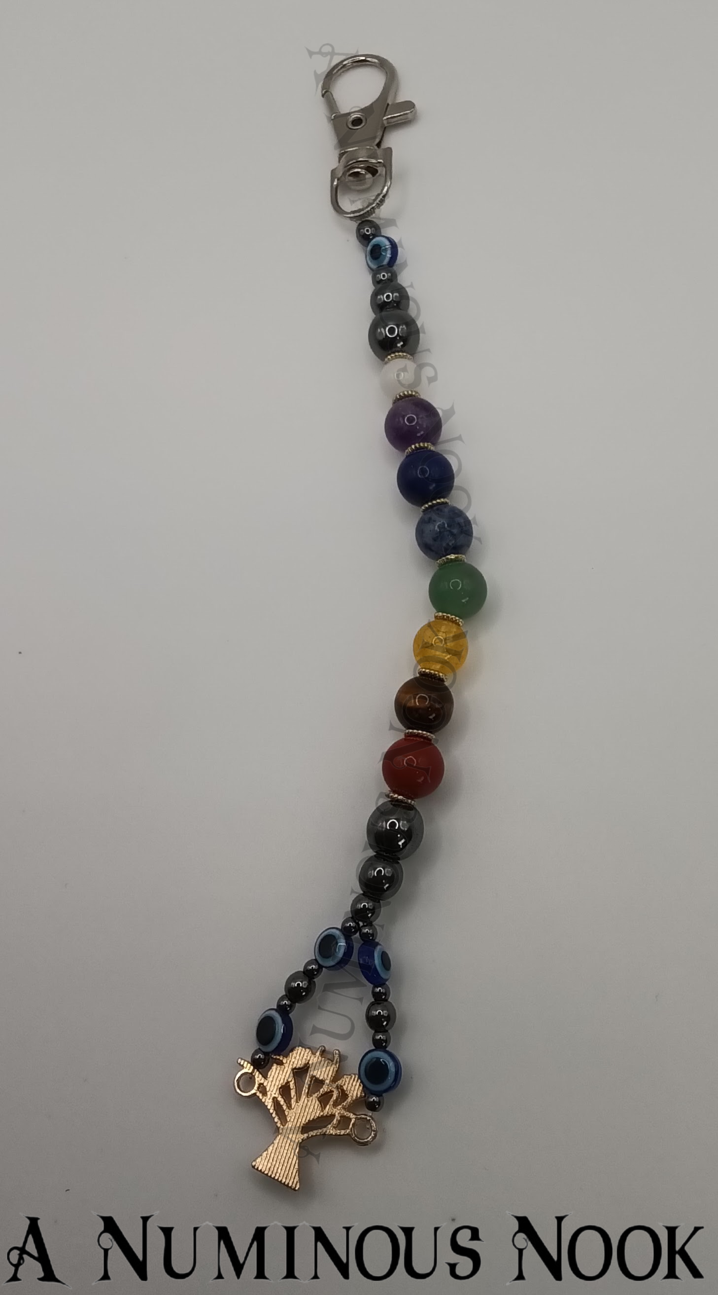 Evil eye tree chakra clip