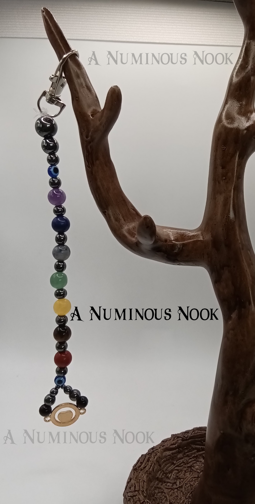 Red evil eye chakra clip